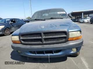 2003 Dodge Dakota Sport с VIN 1D7HL38X33S144315, выставлен на аукционе Copart как лот 65842394 с пробегом Не указан миль и Списание • Salvage title. История ставок и продаж доступна на DreamBid. Изображение 5.
