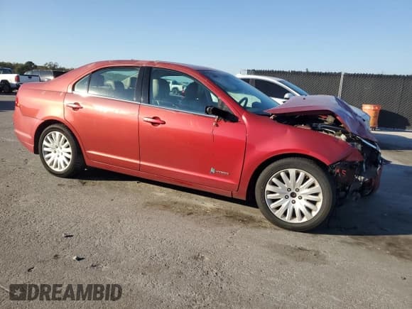 ✅ 2012 Ford Fusion Hybrid • VIN: 3FADP0L36CR408127 • Lot: 93709805. Listed on Copart with 202,528 mi. Free auction sales archive from the USA and detailed vehicle history report at DreamBid. Image 4.