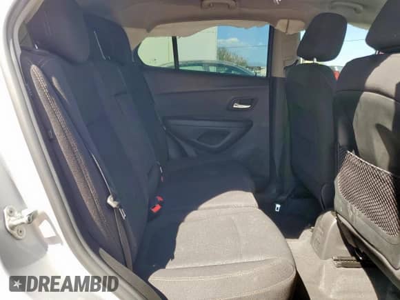 2018 Chevrolet Trax LS z VIN 3GNCJKSB1JL237743, wystawiony jako Copart lot #81329025 z przebiegiem 57 945 mil mil oraz Szkoda całkowita • Salvage title. Historia ofert i sprzedaży dostępna na DreamBid. Obrazek 11.