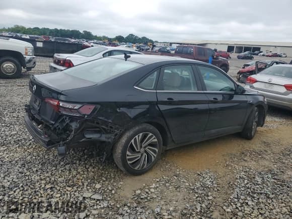 ✅ 2021 Volkswagen Jetta SEL • VIN: 3VWE57BU5MM013374 • Лот: 58579395. Опубликован ранее на Copart с пробегом 50 968 миль. Бесплатный доступ к архиву аукционных продаж из США и подробный отчёт об истории автомобиля на DreamBid. Изображение 3.