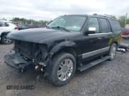 ✅ 2014 Lincoln Navigator • VIN: 5LMJJ2J50EEL03760 • Lot: 42205444. Listed on IAAI with 217,794 mi. Free auction sales archive from the USA and detailed vehicle history report at DreamBid. Image 18.