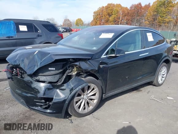 ✅ 2018 Tesla Model X 75D • VIN: 5YJXCDE28JF123376 • Lot: 43592584. Listed on IAAI with 46,004 mi. Free auction sales archive from the USA and detailed vehicle history report at DreamBid. Image 2.