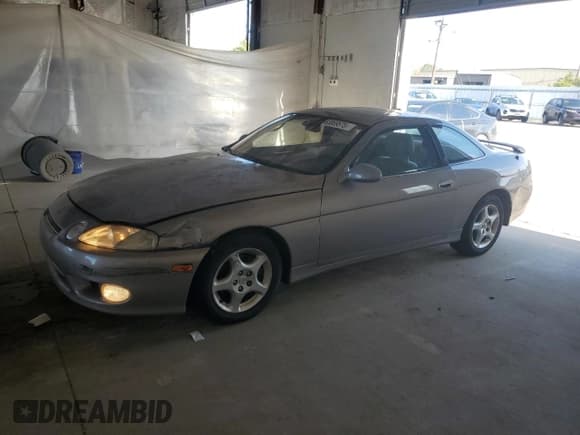 ✅ 1997 Lexus SC 400 • VIN: JT8CH32Y1V0053290 • Лот: 83869575. Опубликован ранее на Copart с пробегом 126 602 миль. Бесплатный доступ к архиву аукционных продаж из США и подробный отчёт об истории автомобиля на DreamBid. Изображение 1.