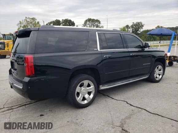 ✅ 2015 Chevrolet Suburban LTZ • VIN: 1GNSKKKC2FR206731 • Lot: 85916455. Listed on Copart with 236,380 mi. Free auction sales archive from the USA and detailed vehicle history report at DreamBid. Image 3.