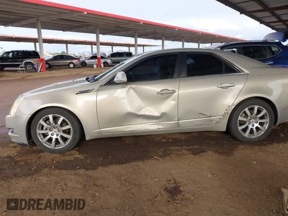 ✅ 2009 Cadillac CTS AWD • VIN: 1G6DT57VX90108701 • Lot: 43744364. Wystawiony na IAAI z przebiegiem 144 356 mil. Bezpłatny archiwum sprzedaży aukcyjnych z USA i szczegółowy raport historii pojazdu na DreamBid. Zdjęcie 6.