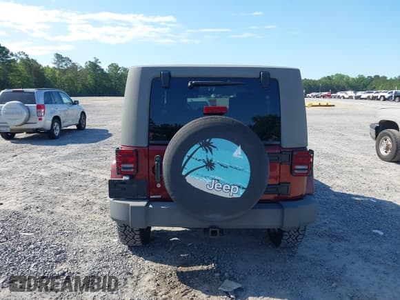 ✅ 2007 Jeep Wrangler Unlimited Sahara • VIN: 1J8GA59187L211825 • Lot: 42313099. Listed on IAAI with 107,554 mi. Free auction sales archive from the USA and detailed vehicle history report at DreamBid. Image 17.