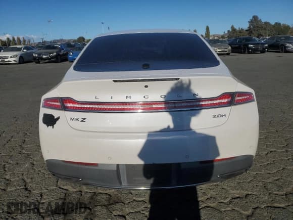✅ 2018 Lincoln MKZ Hybrid Reserve • VIN: 3LN6L5MU0JR621053 • Лот: 76517974. Опубликован ранее на Copart с пробегом 119 086 миль. Бесплатный доступ к архиву аукционных продаж из США и подробный отчёт об истории автомобиля на DreamBid. Изображение 6.