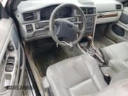 ✅ 2001 Volvo C70 • VIN: YV1NC56DX1J022713 • Лот: 49164995. Опубликован ранее на Copart с пробегом 93 461 миль. Бесплатный доступ к архиву аукционных продаж из США и подробный отчёт об истории автомобиля на DreamBid. Изображение 8.