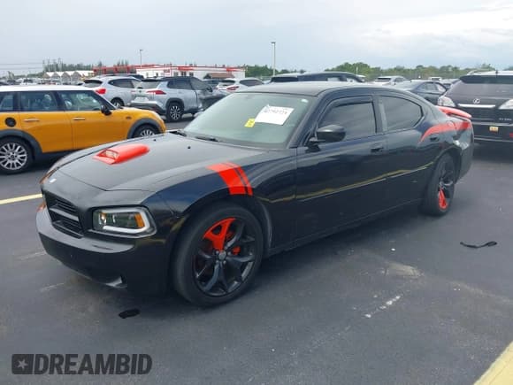 ✅ 2008 Dodge Charger • VIN: 2B3KA43R68H184859 • Лот: 42792724. Опубликован ранее на IAAI с пробегом 164 585 миль. Бесплатный доступ к архиву аукционных продаж из США и подробный отчёт об истории автомобиля на DreamBid. Изображение 2.