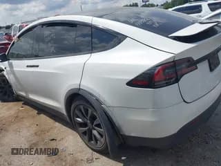✅ 2023 Tesla Model X Plaid • VIN: 7SAXCBE65PF418602 • Lot: 42956757. Listed on IAAI with 44,161 mi. Free auction sales archive from the USA and detailed vehicle history report at DreamBid. Image 3.