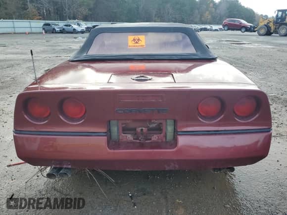 1986 Chevrolet Corvette with VIN 1G1YY6786G5902913, listed as a Copart auction lot 83990034 with Not provided miles and Salvage title. Bid and sale history available at DreamBid. Image 6.