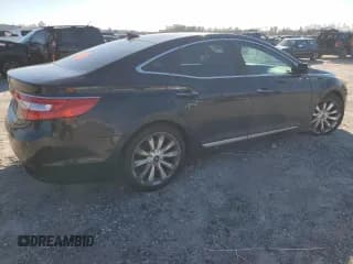 ✅ 2012 Hyundai Azera • VIN: KMHFH4JG0CA161867 • Лот: 86928654. Опубликован ранее на Copart с пробегом 243 946 миль. Бесплатный доступ к архиву аукционных продаж из США и подробный отчёт об истории автомобиля на DreamBid. Изображение 3.