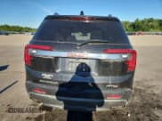 ✅ 2021 GMC Acadia AT4 • VIN: 1GKKNLLS3MZ233658 • Lot: 69571205. Wystawiony na Copart z przebiegiem 56 548 mil. Bezpłatny archiwum sprzedaży aukcyjnych z USA i szczegółowy raport historii pojazdu na DreamBid. Zdjęcie 6.