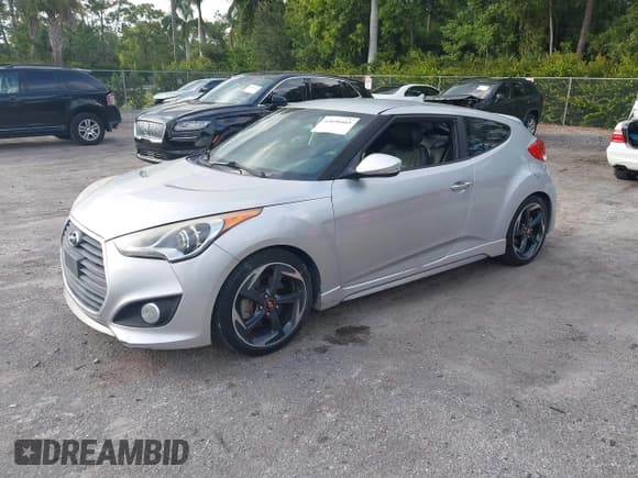 ✅ 2013 Hyundai Veloster Turbo • VIN: KMHTC6AE8DU120642 • Lot: 43650465. Wystawiony na IAAI z przebiegiem 141 731 mil. Bezpłatny archiwum sprzedaży aukcyjnych z USA i szczegółowy raport historii pojazdu na DreamBid. Zdjęcie 2.