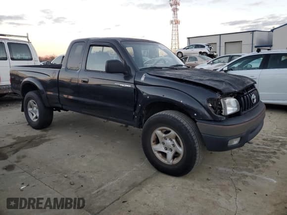✅ 2001 Toyota Tacoma • VIN: 5TEWN72N41Z811380 • Lot: 93242955. Listed on Copart with 265,839 mi. Free auction sales archive from the USA and detailed vehicle history report at DreamBid. Image 4.