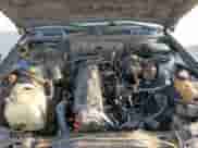 1991 BMW 3 Series z VIN WBABB2316MEC25177, wystawiony jako Copart lot #57317225 z przebiegiem 220 252 mil mil oraz Czysty tytuł • Clean title. Historia ofert i sprzedaży dostępna na DreamBid. Obrazek 11.