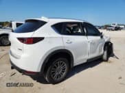 ✅ 2021 Mazda CX-5 Touring • VIN: JM3KFACM9M0418579 • Лот: 89574895. Опубликован ранее на Copart с пробегом 63 678 миль. Бесплатный доступ к архиву аукционных продаж из США и подробный отчёт об истории автомобиля на DreamBid. Изображение 3.