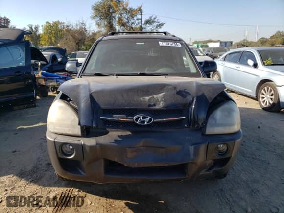 2005 Hyundai Tucson GLS z VIN KM8JN12D45U065618, wystawiony jako Copart lot #77370754 z przebiegiem 87 525 mil mil oraz Szkoda całkowita • Salvage title. Historia ofert i sprzedaży dostępna na DreamBid. Obrazek 5.