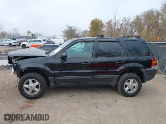 ✅ 2003 Ford Escape XLT Popular • VIN: 1FMCU03163KA70676 • Lot: 43707371. Listed on IAAI with 88,471 mi. Free auction sales archive from the USA and detailed vehicle history report at DreamBid. Image 14.