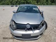 ✅ 2012 Volkswagen Golf TDI • VIN: WVWNM7AJ5CW124468 • Лот: 84703045. Опубликован ранее на Copart с пробегом 97 837 миль. Бесплатный доступ к архиву аукционных продаж из США и подробный отчёт об истории автомобиля на DreamBid. Изображение 5.