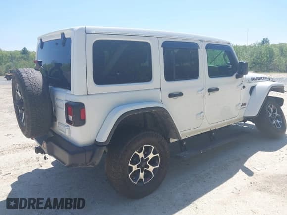 ✅ 2021 Jeep Wrangler Unlimited Rubicon • VIN: 1C4HJXFG5MW586842 • Lot: 42186683. Listed on IAAI with 76,450 mi. Free auction sales archive from the USA and detailed vehicle history report at DreamBid. Image 4.