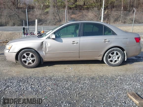 ✅ 2006 Hyundai Sonata GLS • VIN: 5NPEU46FX6H060523 • Лот: 41518409. Опубликован ранее на IAAI с пробегом 245 523 миль. Бесплатный доступ к архиву аукционных продаж из США и подробный отчёт об истории автомобиля на DreamBid. Изображение 14.