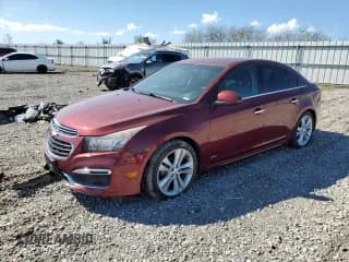 ✅ 2015 Chevrolet Cruze LTZ • VIN: 1G1PG5SBXF7185639 • Lot: 84064925. Listed on Copart with 114,494 mi. Free auction sales archive from the USA and detailed vehicle history report at DreamBid. Image 1.