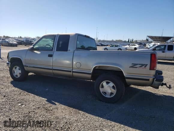 1997 Chevrolet Silverado 1500 z VIN 2GCEK19R8V1243476, wystawiony jako Copart lot #90307375 z przebiegiem 175 661 mil mil oraz Szkoda całkowita • Salvage title. Historia ofert i sprzedaży dostępna na DreamBid. Obrazek 2.