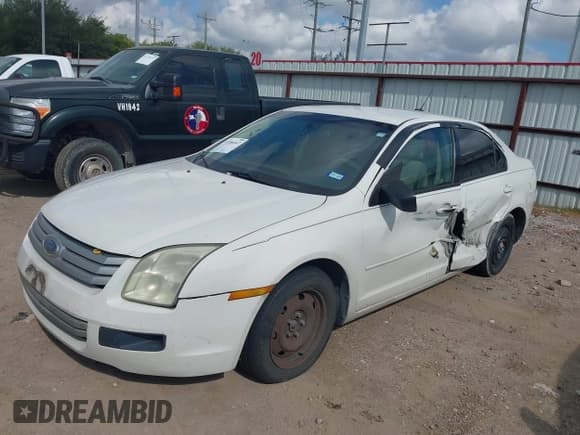 ✅ 2008 Ford Fusion S • VIN: 3FAHP06Z28R189028 • Лот: 43206647. Опубликован ранее на IAAI с пробегом 251 212 миль. Бесплатный доступ к архиву аукционных продаж из США и подробный отчёт об истории автомобиля на DreamBid. Изображение 2.
