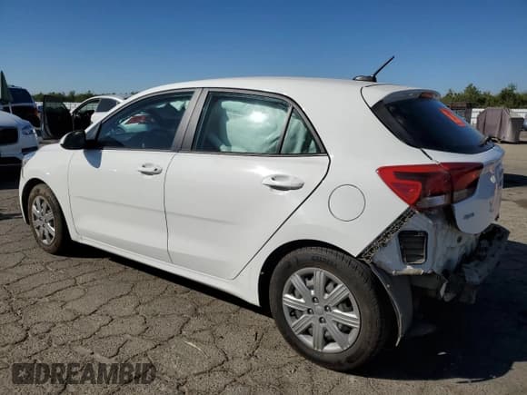 ✅ 2022 Kia Rio S • VIN: 3KPA25AD7NE483854 • Лот: 85344305. Опубликован ранее на Copart с пробегом 64 504 миль. Бесплатный доступ к архиву аукционных продаж из США и подробный отчёт об истории автомобиля на DreamBid. Изображение 2.