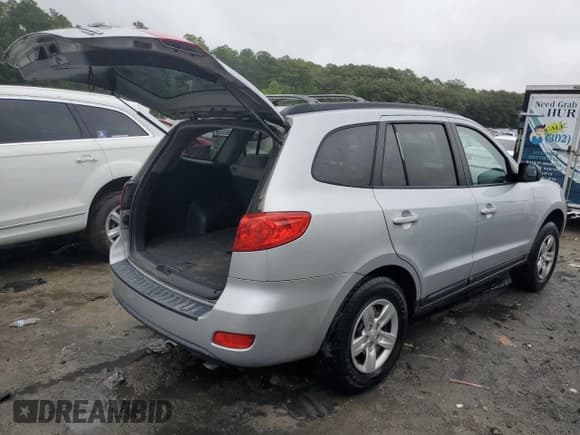 ✅ 2009 Hyundai Santa Fe GLS • VIN: 5NMSG73D29H300079 • Lot: 68749204. Listed on Copart with 154,906 mi. Free auction sales archive from the USA and detailed vehicle history report at DreamBid. Image 3.