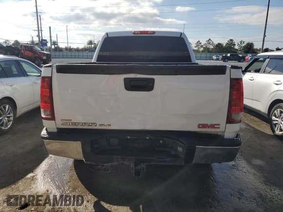 ✅ 2013 GMC Sierra 1500 SLE • VIN: 3GTP2VE74DG331919 • Лот: 90463675. Опубликован ранее на Copart с пробегом 166 318 миль. Бесплатный доступ к архиву аукционных продаж из США и подробный отчёт об истории автомобиля на DreamBid. Изображение 6.