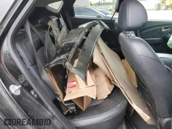 2013 Hyundai Tucson GLS z VIN KM8JU3AC4DU718650, wystawiony jako Copart lot #58798255 z przebiegiem Nie podano mil oraz Szkoda całkowita • Salvage title. Historia ofert i sprzedaży dostępna na DreamBid. Obrazek 11.