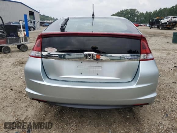 ✅ 2012 Honda Insight EX • VIN: JHMZE2H79CS004934 • Лот: 67858765. Опубликован ранее на Copart с пробегом 148 241 миль. Бесплатный доступ к архиву аукционных продаж из США и подробный отчёт об истории автомобиля на DreamBid. Изображение 6.