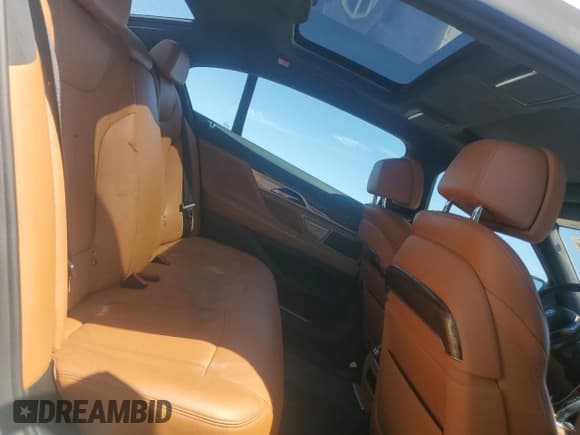 ✅ 2018 BMW 7 Series 740i xDrive • VIN: WBA7E4C52JGV24125 • Lot: 48164214. Listed on Copart with 77,695 mi. Free auction sales archive from the USA and detailed vehicle history report at DreamBid. Image 10.