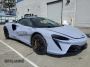 ✅ 2025 McLaren Artura • VIN: SBM16BEA4SW002969 • Лот: 48354735. Опубликован ранее на Copart с пробегом 882 миль. Бесплатный доступ к архиву аукционных продаж из США и подробный отчёт об истории автомобиля на DreamBid. Изображение 4.