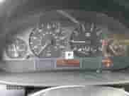 1999 BMW 3 Series 323i with VIN WBAAM3333XKC57572, listed as a Copart auction lot 57478895 with 177,561 mi miles and Salvage title. Bid and sale history available at DreamBid. Image 9.