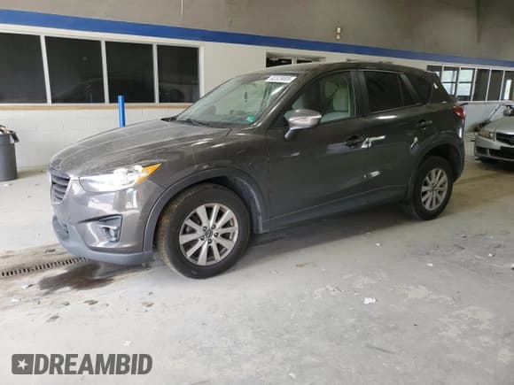 ✅ 2016 Mazda CX-5 Touring • VIN: JM3KE4CYXG0713069 • Lot: 82329005. Wystawiony na Copart z przebiegiem 135 308 mil. Bezpłatny archiwum sprzedaży aukcyjnych z USA i szczegółowy raport historii pojazdu na DreamBid. Zdjęcie 1.