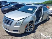 ✅ 2014 Cadillac XTS Luxury • VIN: 2G61M5S31E9199170 • Lot: 42150000. Listed on IAAI with 135,414 mi. Free auction sales archive from the USA and detailed vehicle history report at DreamBid. Image 2.