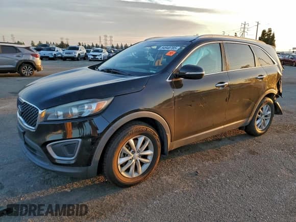✅ 2016 Kia Sorento LX • VIN: 5XYPG4A56GG153207 • Lot: 94940785. Listed on Copart with 196,791 mi. Free auction sales archive from the USA and detailed vehicle history report at DreamBid. Image 1.