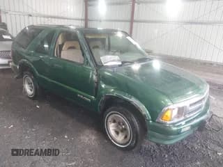 ✅ 1997 Chevrolet Blazer LS • VIN: 1GNCS18W5VK109319 • Lot: 42603720. Wystawiony na IAAI z przebiegiem 91 974 mil. Bezpłatny archiwum sprzedaży aukcyjnych z USA i szczegółowy raport historii pojazdu na DreamBid. Zdjęcie 1.