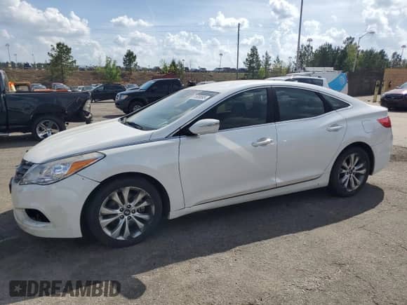 2014 Hyundai Azera с VIN KMHFG4JG0EA352016, выставлен на аукционе Copart как лот 51609895 с пробегом 186 157 миль миль и Чистый • Clean title. История ставок и продаж доступна на DreamBid. Изображение 1.