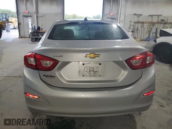 ✅ 2018 Chevrolet Cruze LS • VIN: 1G1BC5SM8J7122555 • Lot: 70678885. Listed on Copart with 101,938 mi. Free auction sales archive from the USA and detailed vehicle history report at DreamBid. Image 6.
