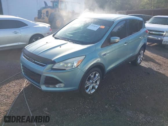 ✅ 2013 Ford Escape SEL • VIN: 1FMCU0H93DUC47883 • Lot: 43498942. Listed on IAAI with 158,053 mi. Free auction sales archive from the USA and detailed vehicle history report at DreamBid. Image 2.