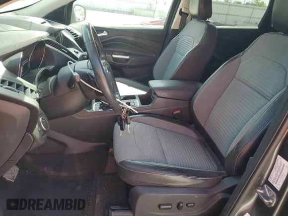 2018 Ford Escape SE z VIN 1FMCU9GD6JUD48647, wystawiony jako Copart lot #70868345 z przebiegiem 102 072 mil mil oraz Szkoda całkowita • Salvage title. Historia ofert i sprzedaży dostępna na DreamBid. Obrazek 7.