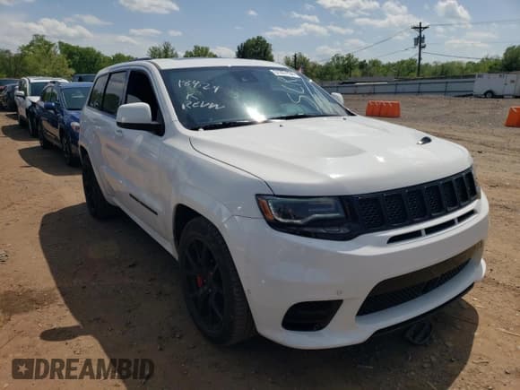 ✅ 2018 Jeep Grand Cherokee • VIN: NJ1449E • Lot: 51357834. Listed on Copart with 32,619 mi. Free auction sales archive from the USA and detailed vehicle history report at DreamBid. Image 4.