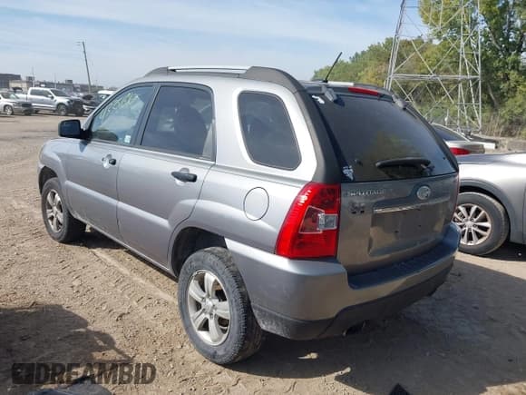 ✅ 2009 Kia Sportage LX • VIN: KNDJF724597601338 • Lot: 43351610. Wystawiony na IAAI z przebiegiem 177 479 mil. Bezpłatny archiwum sprzedaży aukcyjnych z USA i szczegółowy raport historii pojazdu na DreamBid. Zdjęcie 3.