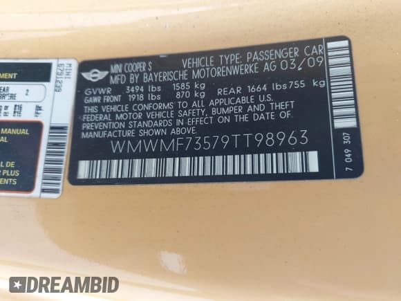 ✅ 2009 MINI Hardtop S • VIN: WMWMF73579TT98963 • Lot: 43027387. Listed on IAAI with 199,451 mi. Free auction sales archive from the USA and detailed vehicle history report at DreamBid. Image 9.