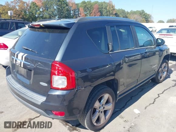 ✅ 2014 Jeep Compass High Altitude • VIN: 1C4NJCEA7ED645301 • Lot: 43647309. Listed on IAAI with 196,471 mi. Free auction sales archive from the USA and detailed vehicle history report at DreamBid. Image 4.