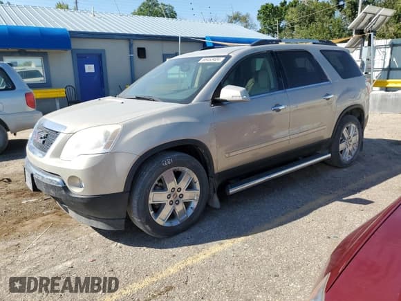 ✅ 2010 GMC Acadia SLT2 • VIN: 1GKLRNEDXAJ121131 • Lot: 68453404. Listed on Copart with 130,828 mi. Free auction sales archive from the USA and detailed vehicle history report at DreamBid. Image 1.